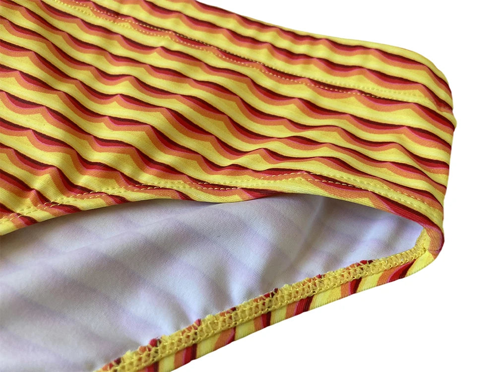 Heatwave Ripple Swim Brief — Low-Rise Yellow/Red Ripple Print, Pouch Lift